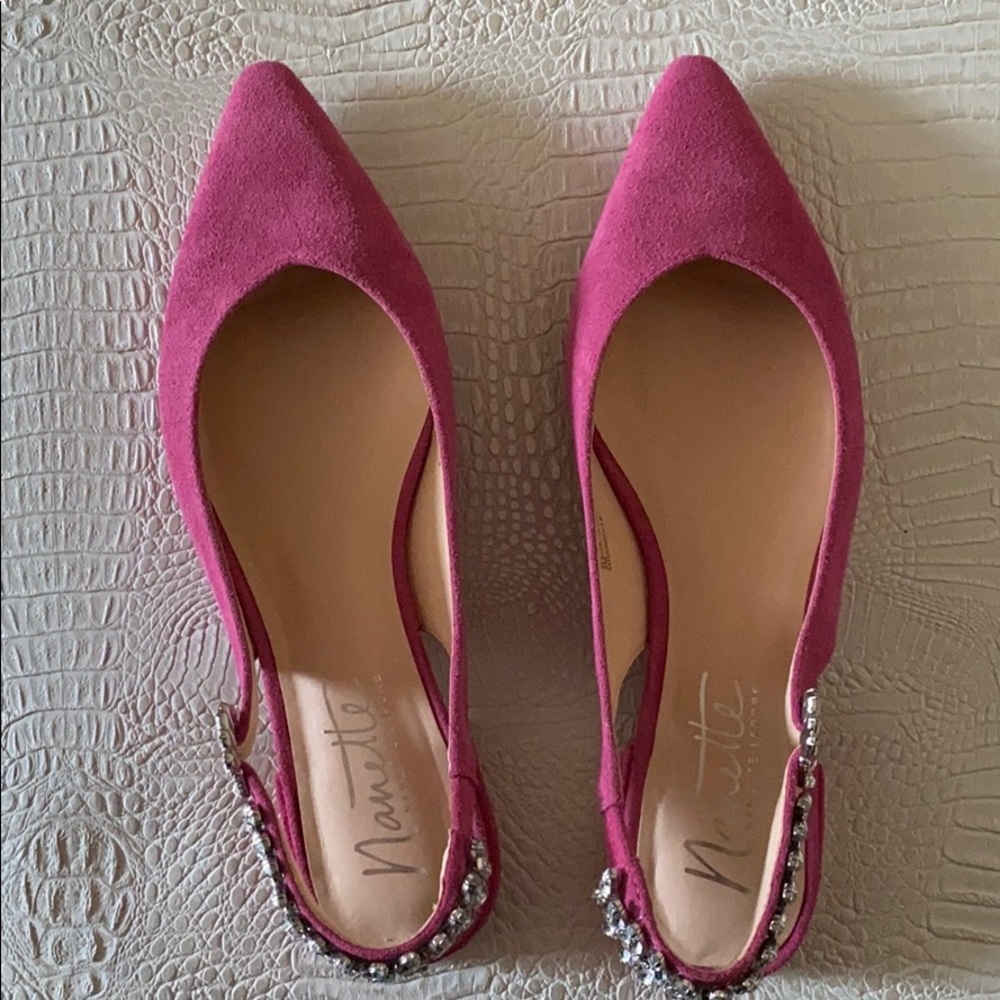 Pink flats with silver embellishments